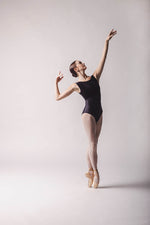 Claire Leotard, Color: Black  Features a sleek and contouring design, a velour bust panel and boat neck, V-back and a tank silhouette. By worldwide Ballet full front view