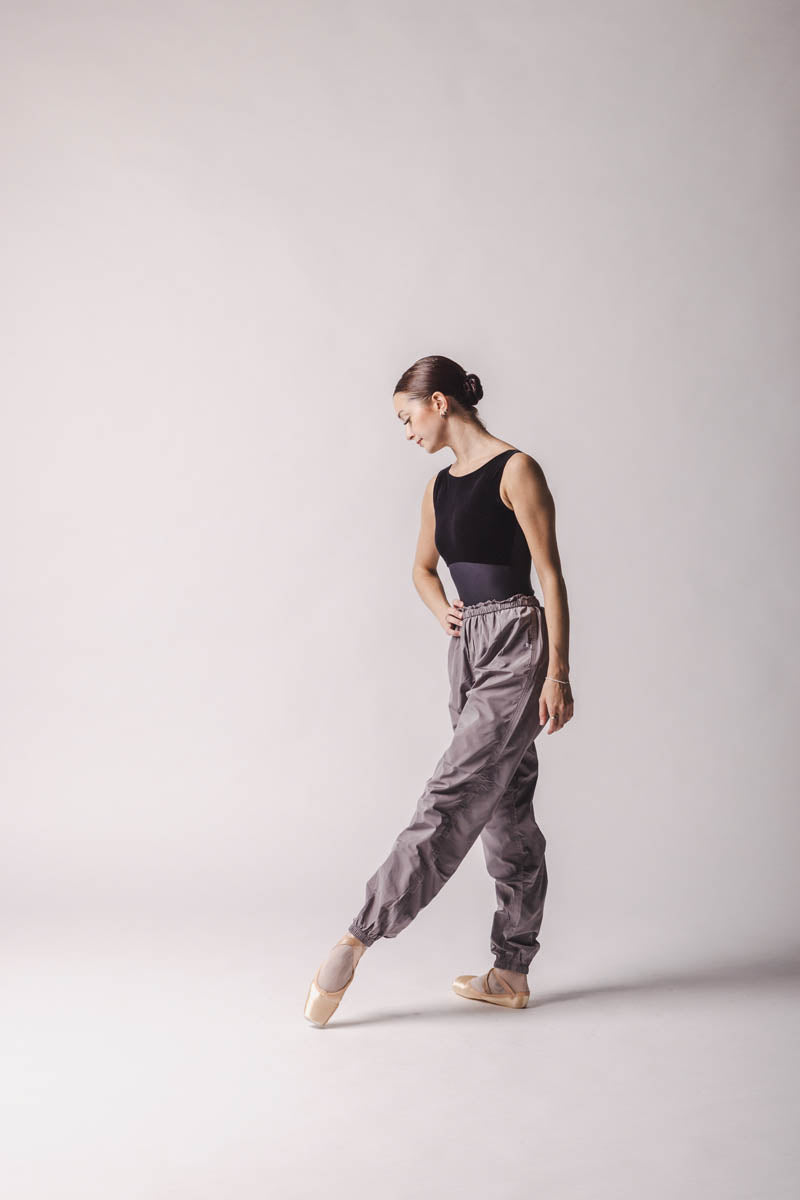 The dancer is wearing titanium Trashbag pants, perfect warm up pants, by worldwide ballet
