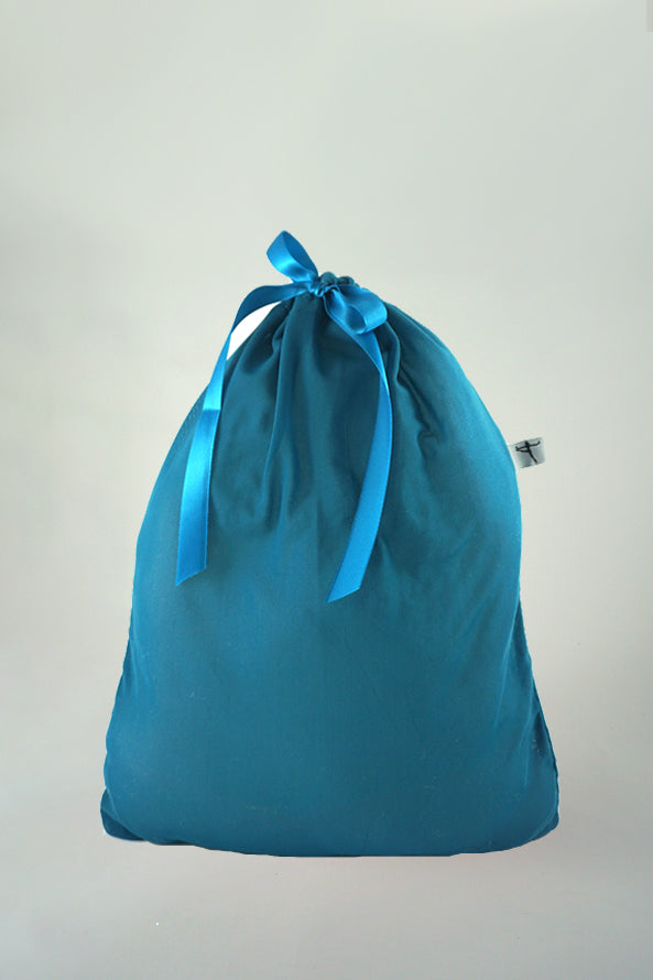 A tile blue small mesh bag featuring a matching satin ribbon closure
