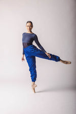 The dancer is wearing Royal blue crop top, by worldwide ballet