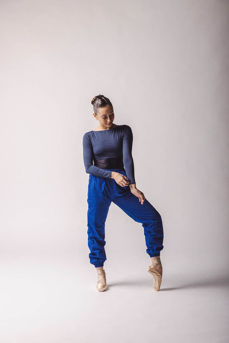 The dancer is wearing Royal blue crop top, by worldwide ballet