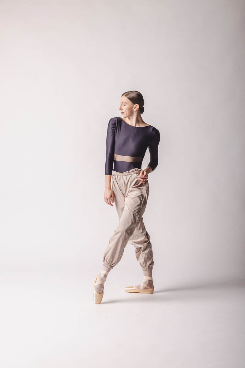 Elle is wearing Beige Trashbag Pants, perfect warm up pants, By worldwide Ballet