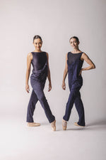The dancers are wearing overall, on the right dark grey overall, on the left, dark blue overall, by worldwide ballet